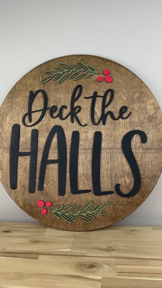 Deck the Halls Christmas Wood Round Sign – 18 Inches – Red, Green & Black Laser-Cut Design